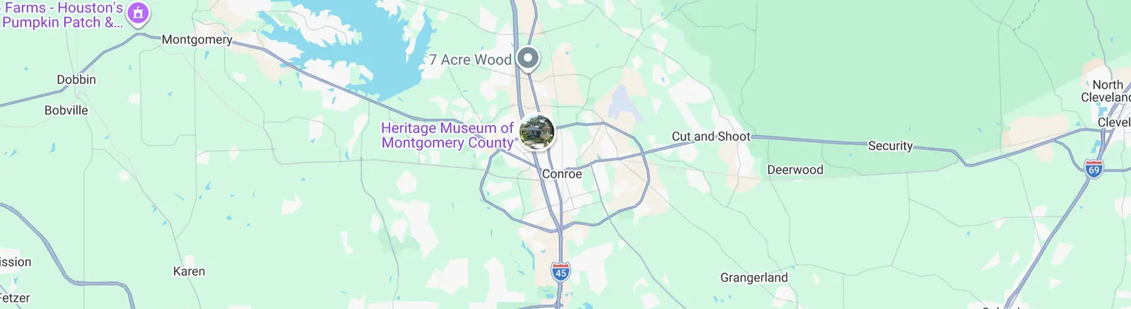 Map showing the Montgomery County Texas area including Conroe, Montgomery, Willis, and Splendora, with Lake Conroe to the north, I-45 running through the center, and nearby landmarks including The Woodlands, WG Jones State Forest, and Heritage Museum of Montgomery County.