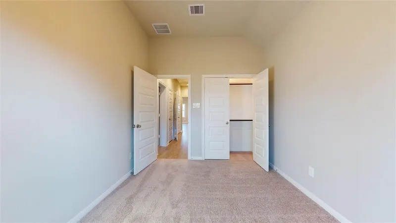 Hallway with bedroom doors at 16701 Eastchase Street, Montgomery, TX