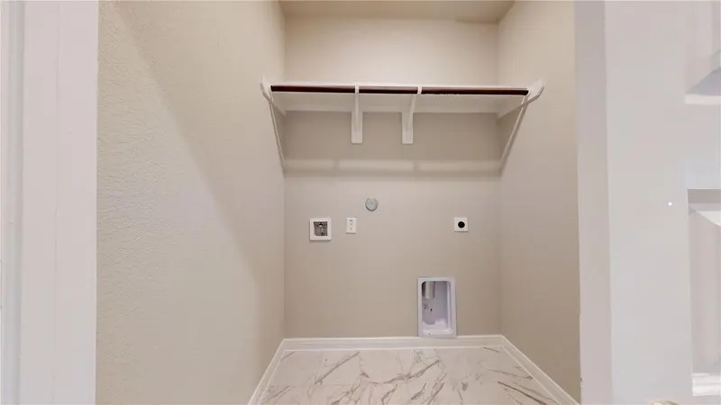 Laundry and utility room at 16701 Eastchase Street, Montgomery, TX