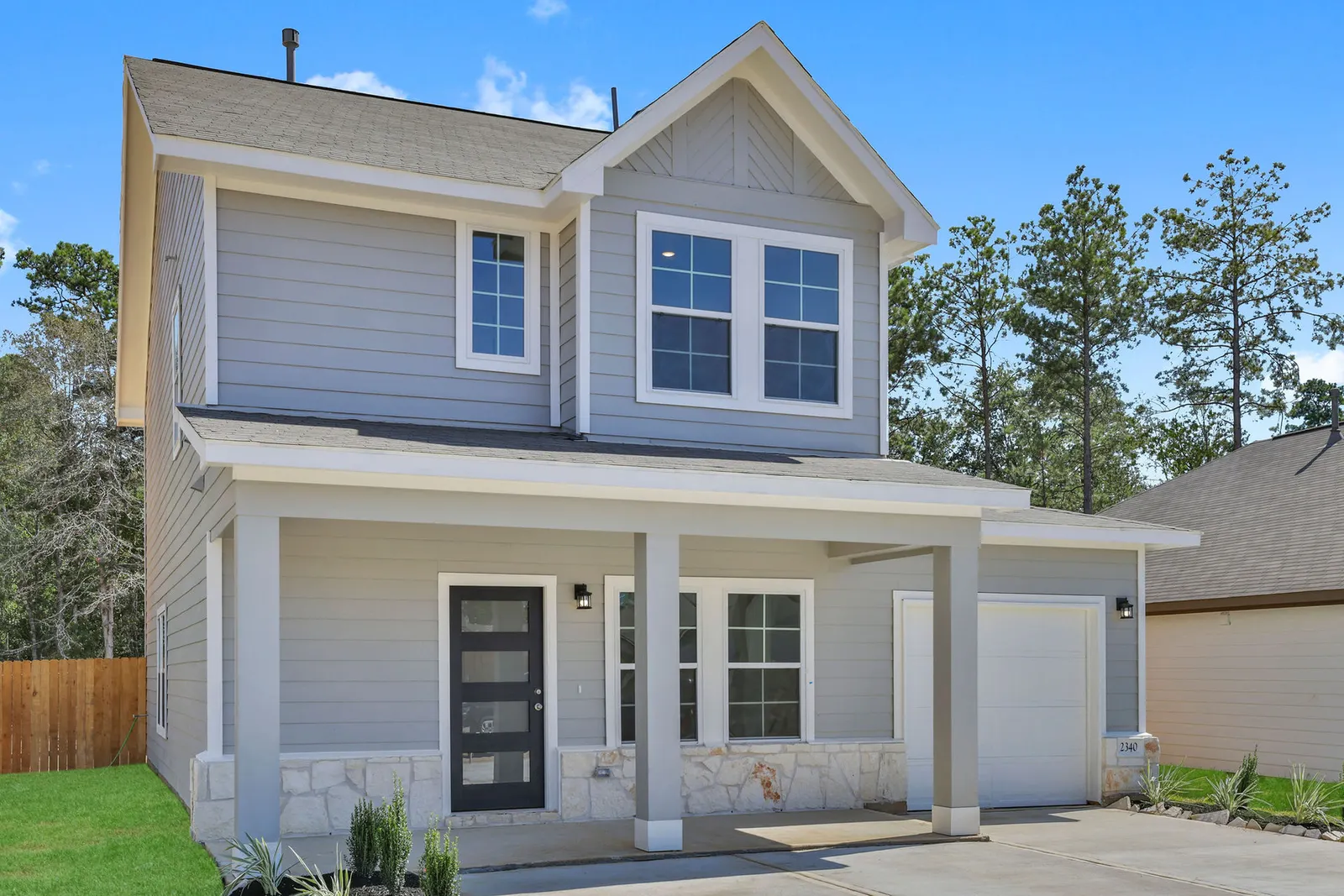 Two story front exterior at Lake Conroe Village, Montgomery, TX