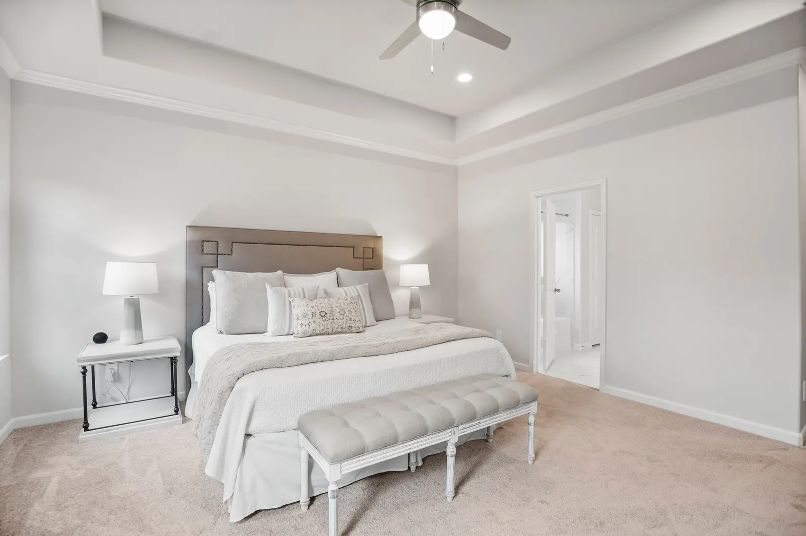 monochromatic primary bedroom in Conroe Texas